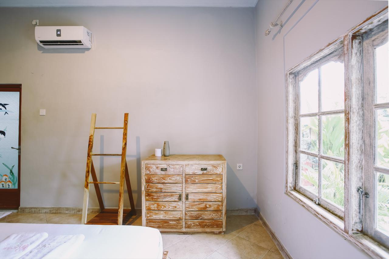 Отель Swan House Canggu Экстерьер фото