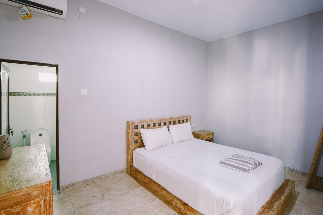 Отель Swan House Canggu Экстерьер фото